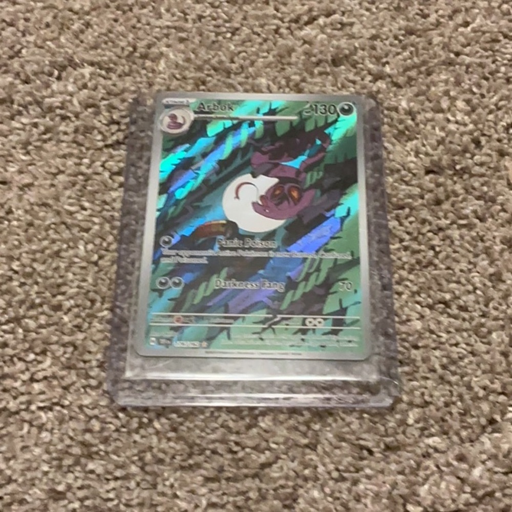 Pokemon Card with Holographic Blue and Silver Design